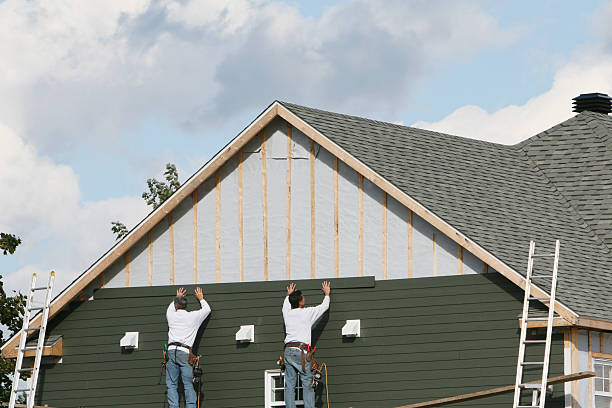 Professional Siding Repair technician working in Railroad, PA